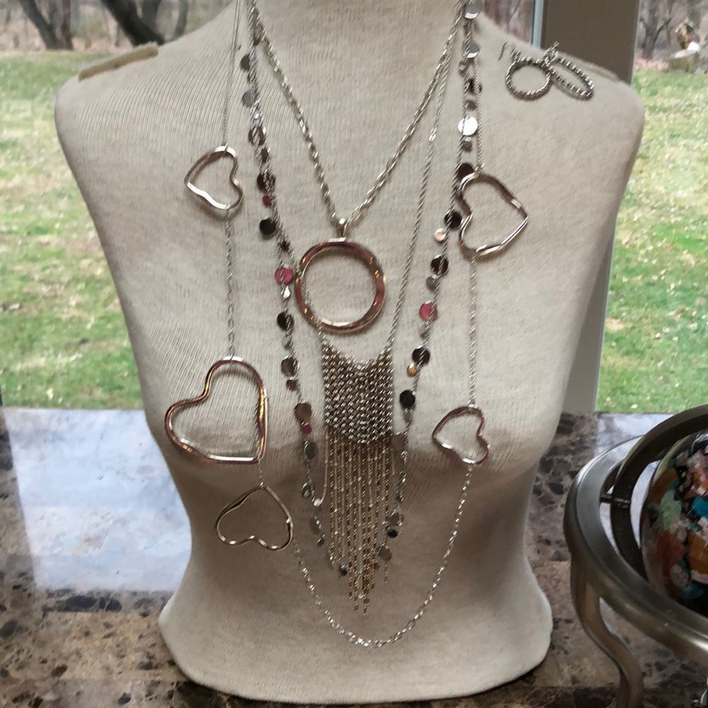 Silver tone necklace with earrings group